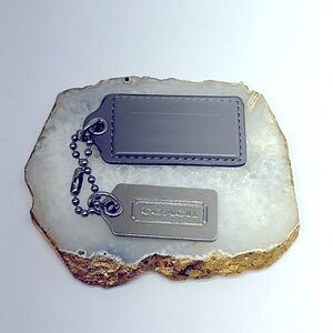 Coach hang/key Tag 2 pcs. Gray and silver.
